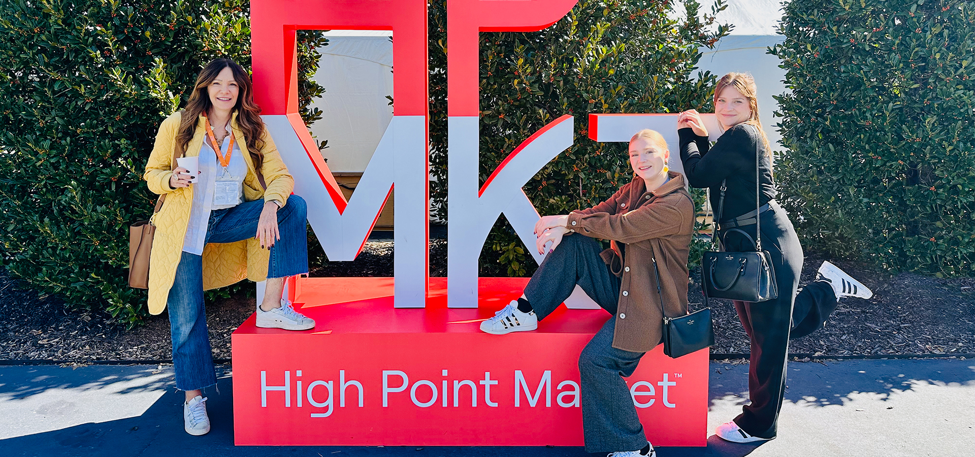 Three interior designers attending High Point Market.