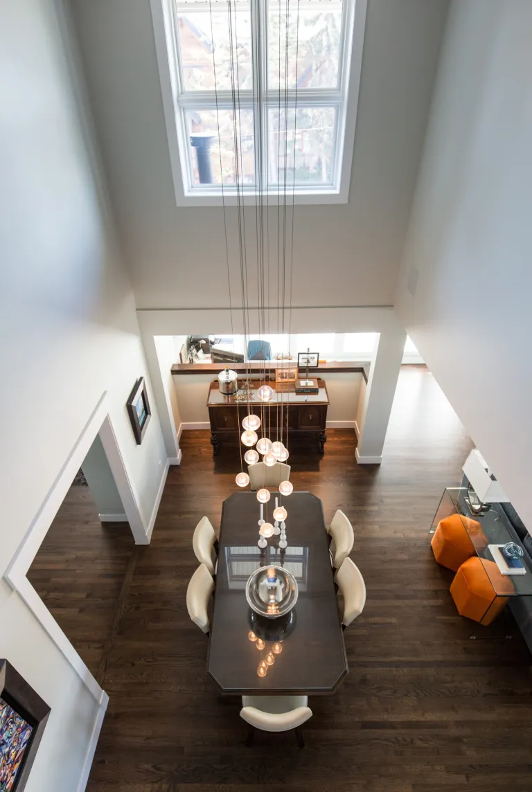 Looking down on a newly renovated dining room in an open concept home.